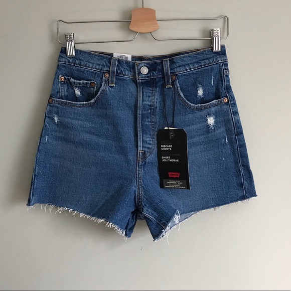 Levi's Pants - Levi’s // Ribcage High Waisted Distressed Cut Off Denim Shorts in Medium Blue